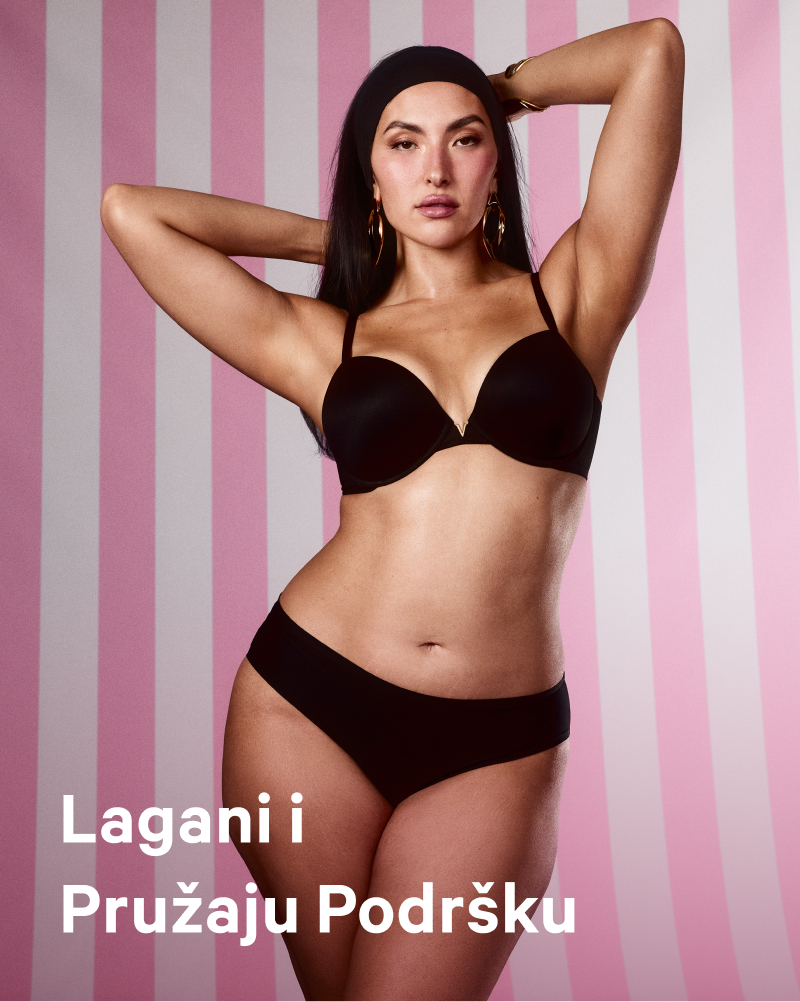 Woman wearing Victoria's Secret baby pink adaptable bra